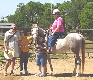 Raba with Carol Mulder and family. Her grandsons are learning to ride on Raba.